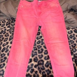 Skinny legs with cut strings on the legs